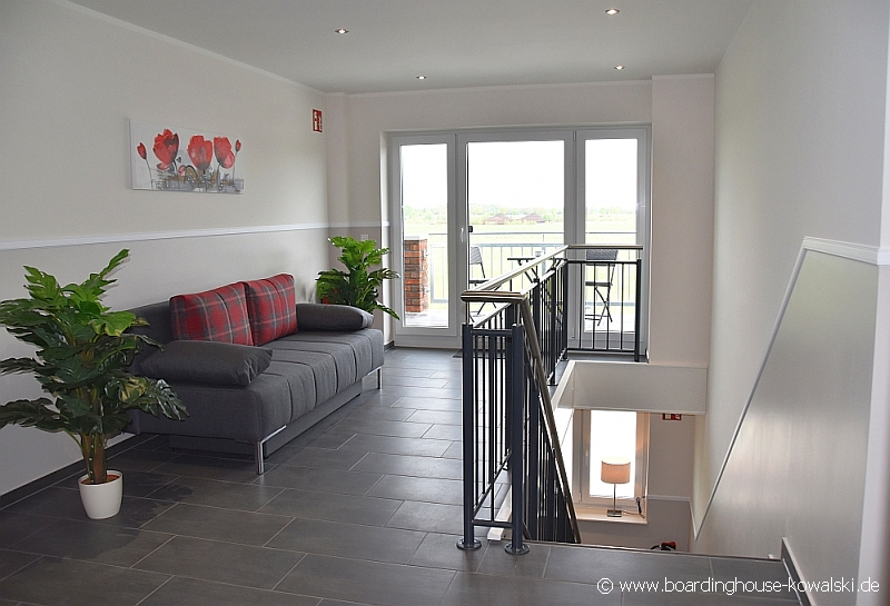 Treppenhaus Boardinghouse Oldenburg Ammerlant • Foto GrAbo | https://www.boardinghouse-kowalski.de